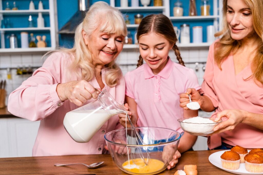 Des personnes préparant des oeufs au lait dans la cuisine